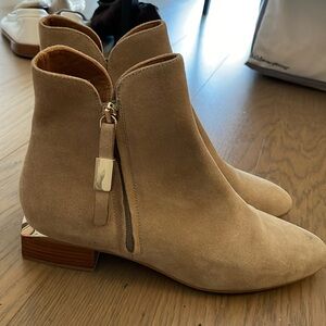 See By Chloe ankle boots with gold accents